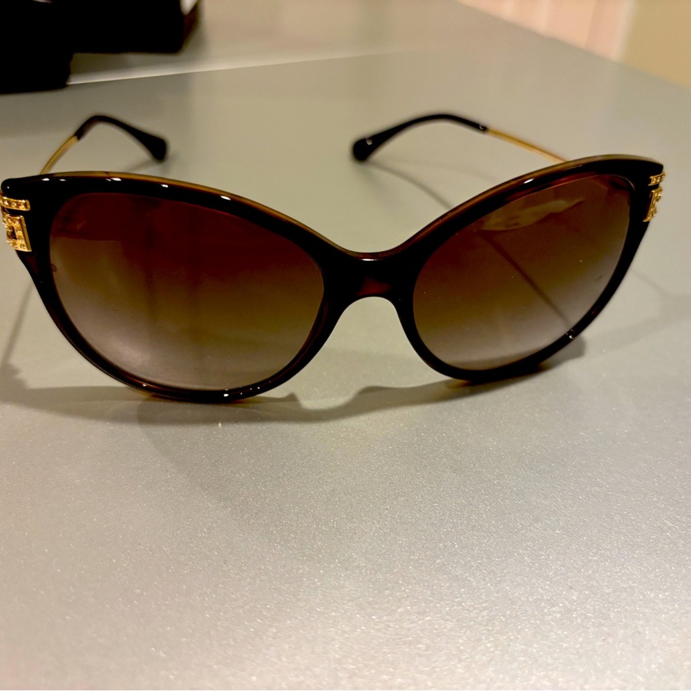 Versace sunglasses with case, box, and Versace cloth. Never worn